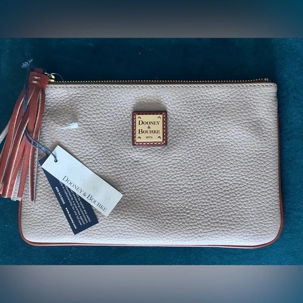 Copy - 𝅺DOONEY and Bourke Pink & TanTassel Clutch NWT
